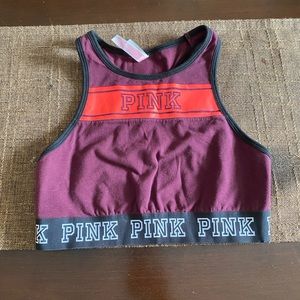 Racer tank size small. By Pink